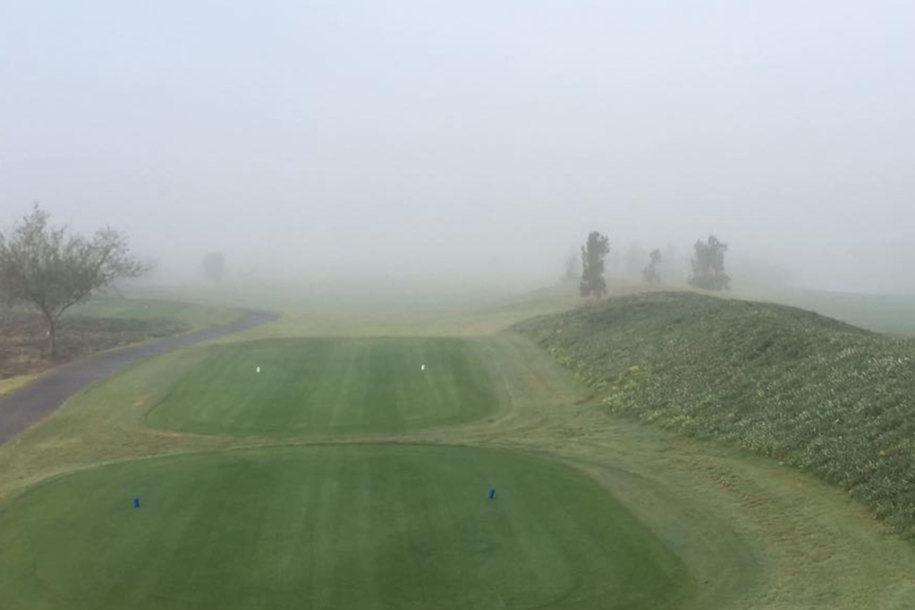 golf course with fog